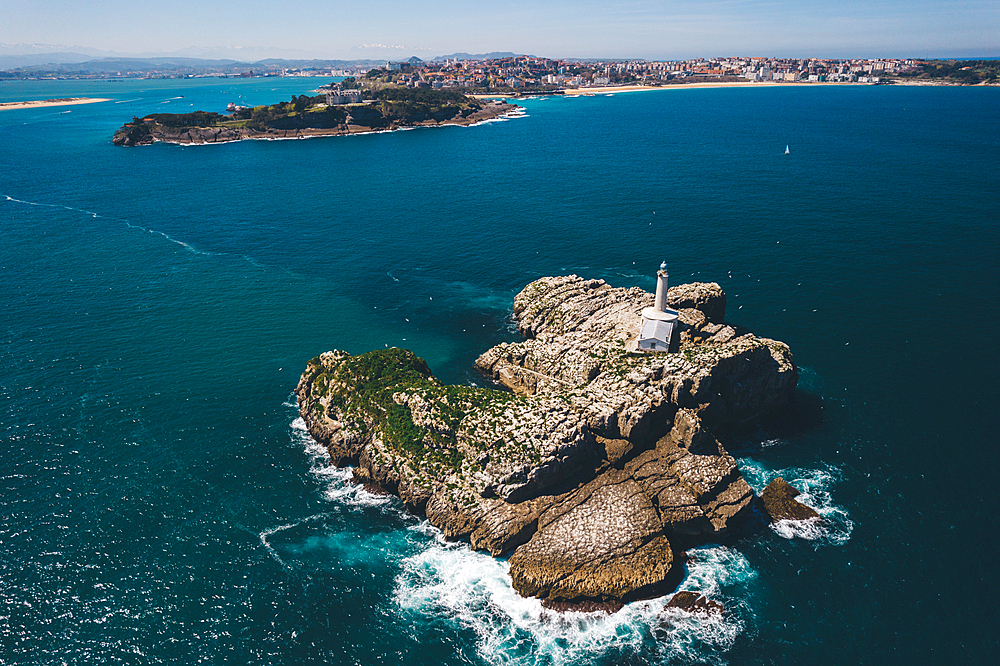 Aerial view of Faro De La Isla De Mouro (Faro de Mouro) across from the Magdalena Peninsula in Santander, Cantabria, Spain, Europe