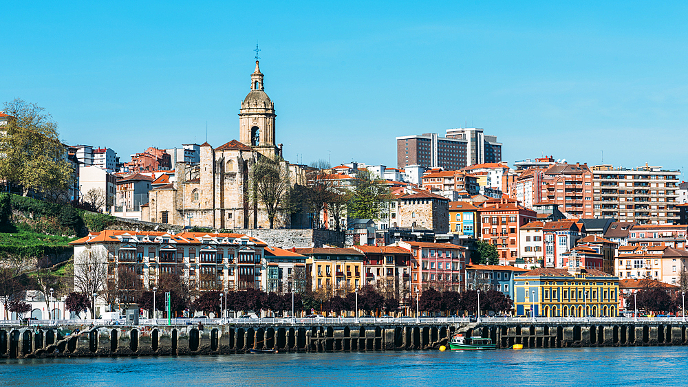 Andra Maria Basilika next to the River Nervion promenade in Portugalete, Bilbao, Basque Country, Spain, Europe