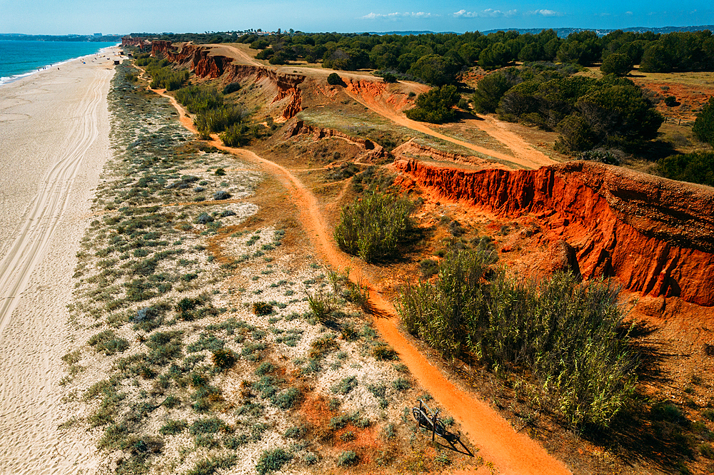 View of Praia da Falesia in Vilamoura, characterized by red cliffs, Algarve, Portugal, Europe