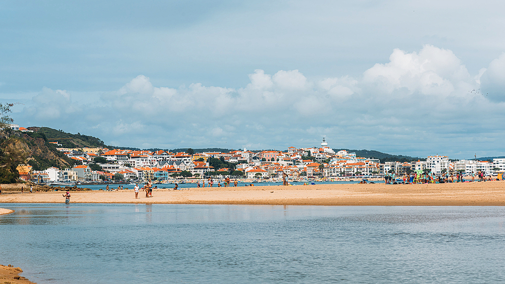 View of Sao Martinho do Porto beach, a wide white-sand beach, backed by dunes in a secluded bay, Oeste, Portugal, Europe