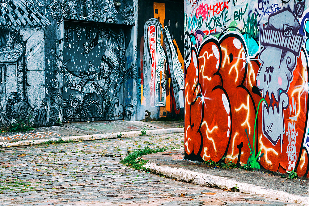 Beco do Batman, the nickname for the area around the Vila Madalena neighborhood with its dense concentation of graffiti lining the streets, popular with tourists, Sao Paulo, Brazil, South America