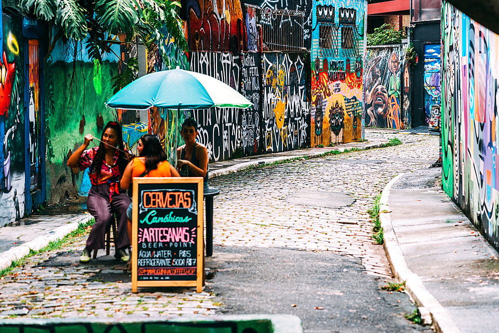 Beco do Batman, the nickname for the area around the Vila Madalena neighborhood with its dense concentation of graffiti lining the streets, popular with tourists, Sao Paulo, Brazil, South America