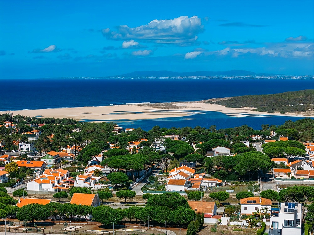 The Lagoa de Albufeira, a picturesque lagoon opening out on a beautiful beach, the Praia da Lagoa de Albufeira, Costa da Caparica coastline, Portugal, Europe