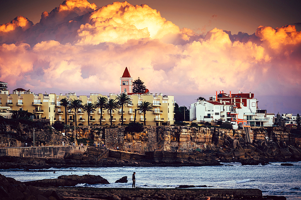 Dramatic magenta sunset in the promenade at Estoril, Portugal, Europe