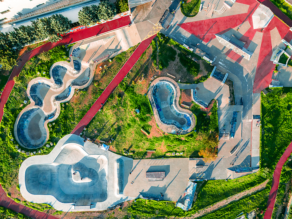 Aerial drone top down view of Parque das Geracoes youth skateboard park in Sao Joao do Estoril, Portugal