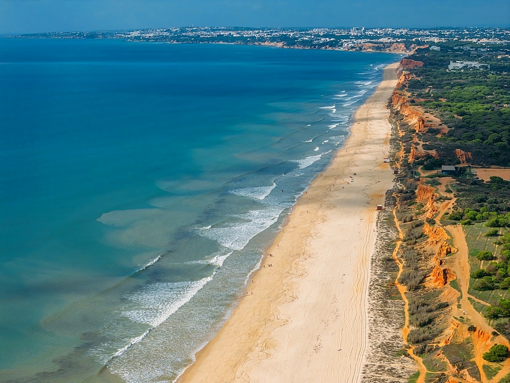 Aerial drone view of Falesia Beach in Vilamoura, Algarve, Portugal