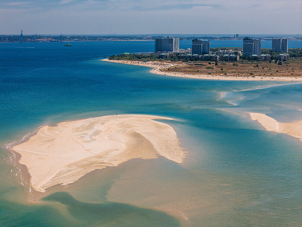 Tróia is a peninsula located in Grândola Municipality (parish of Carvalhal) , Portugal, next to the Sado River estuary. Tourism is the peninsula's main economic activity due to its long beaches facing the Atlantic