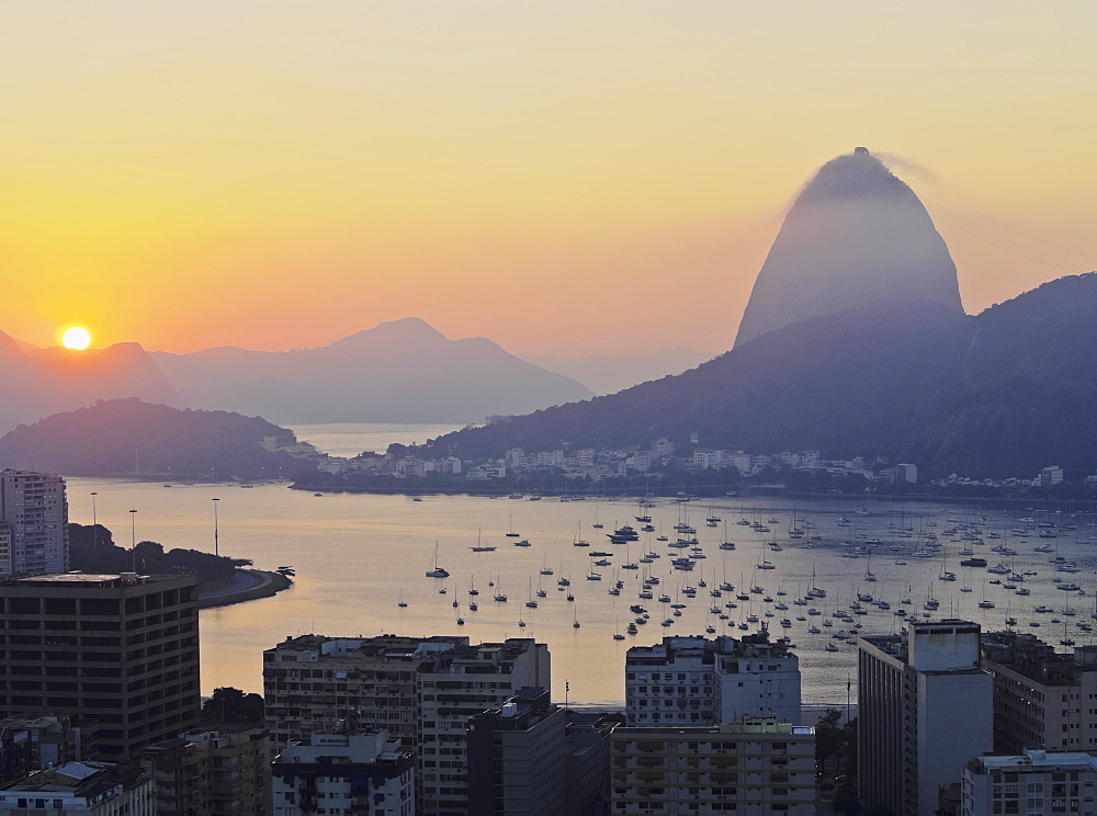 View over Botafogo Neighbourhood towards the Sugarloaf Mountain at sunrise, Rio de Janeiro, Brazil, South America