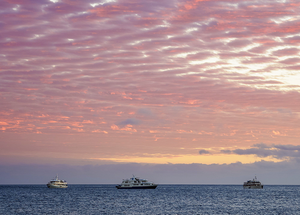 Cruise ships off Bartolome Island at sunrise, Galapagos, UNESCO World Heritage Site, Ecuador, South America