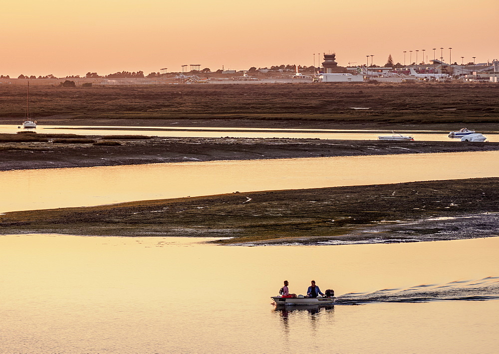 View towards Ria Formosa Natural Park at sunset, Faro, Algarve, Portugal, Europe