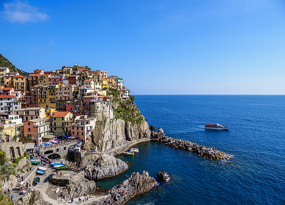 Ferry on the coast of Manarola Village, elevated view, Cinque Terre, UNESCO World Heritage Site, Liguria, Italy, Europe