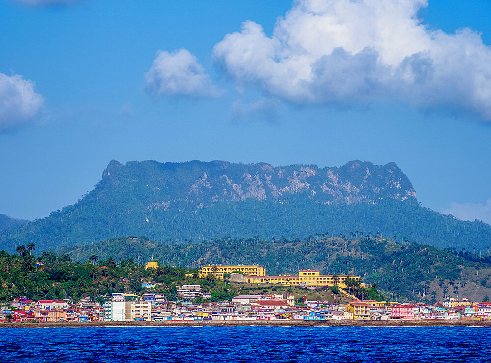 View over Bahia de Miel towards city and El Yunque Mountain, Baracoa, Guantanamo Province, Cuba, West Indies, Caribbean, Central America