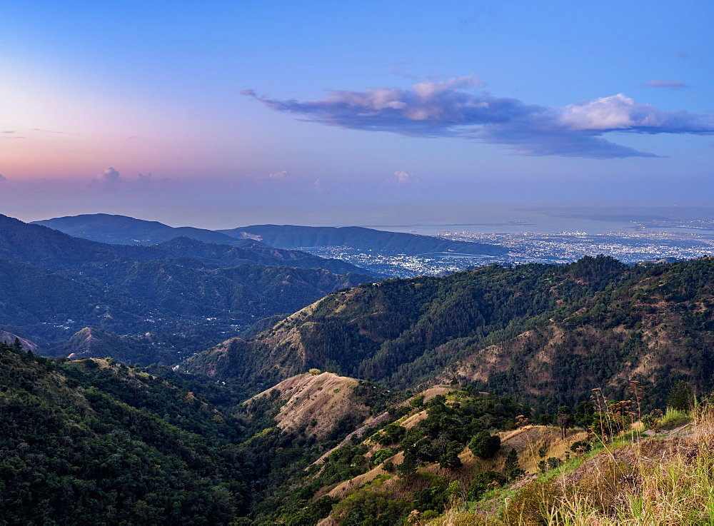 View over Blue Mountains towards Kingston at dawn, Saint Andrew Parish, Jamaica, West Indies, Caribbean, Central America