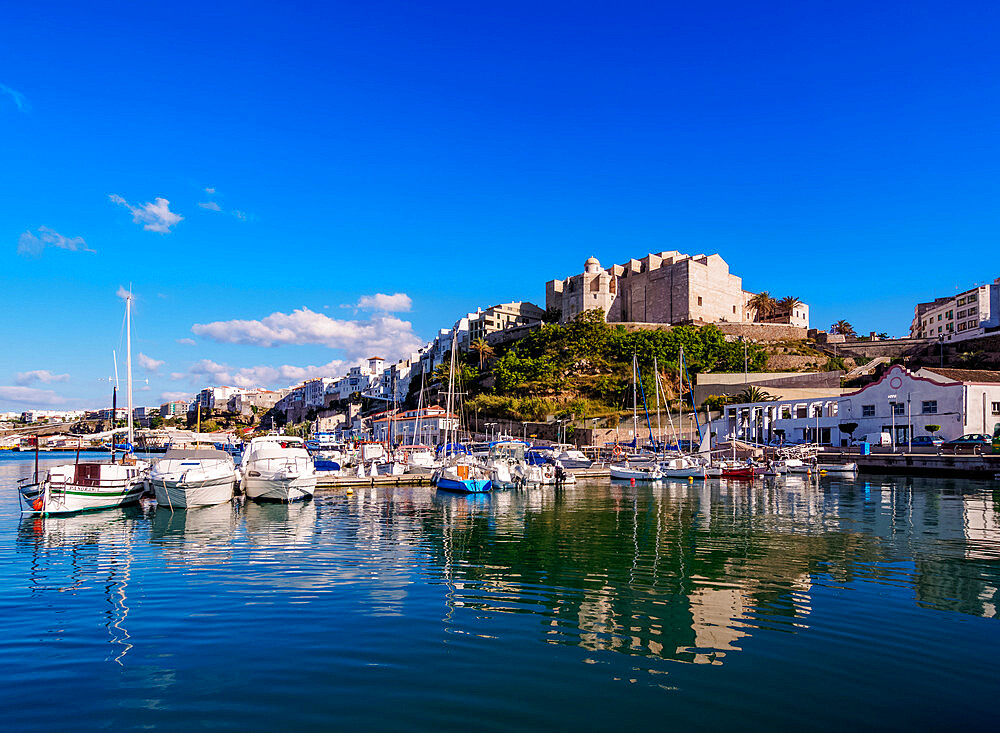 Boats in port and Saint Francis Monastery, Mahon (Mao), Menorca (Minorca), Balearic Islands, Spain, Mediterranean, Europe