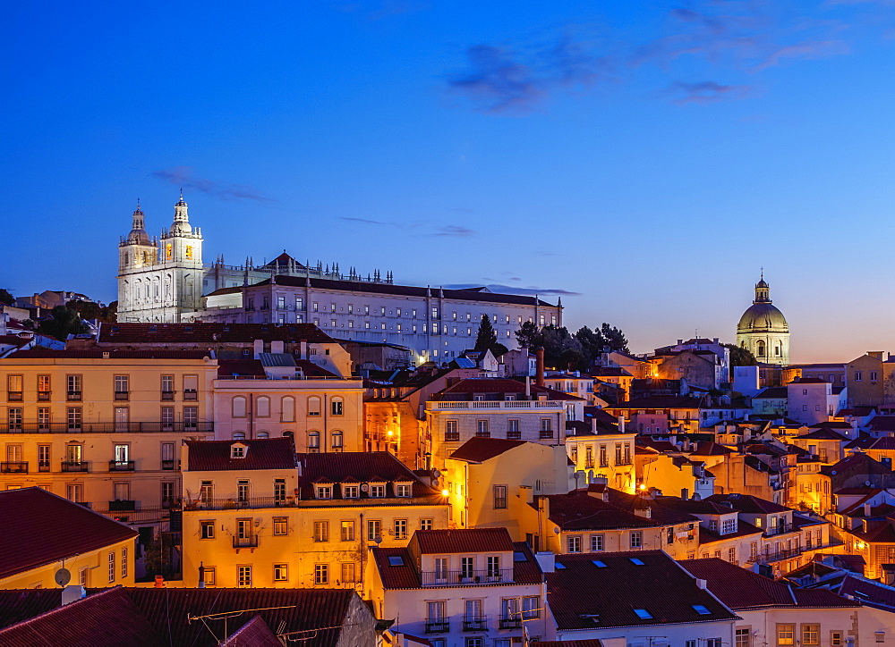 Miradouro das Portas do Sol, twilight view over Alfama Neighbourhood towards the Sao Vicente de Fora Monastery, Lisbon, Portugal, Europe