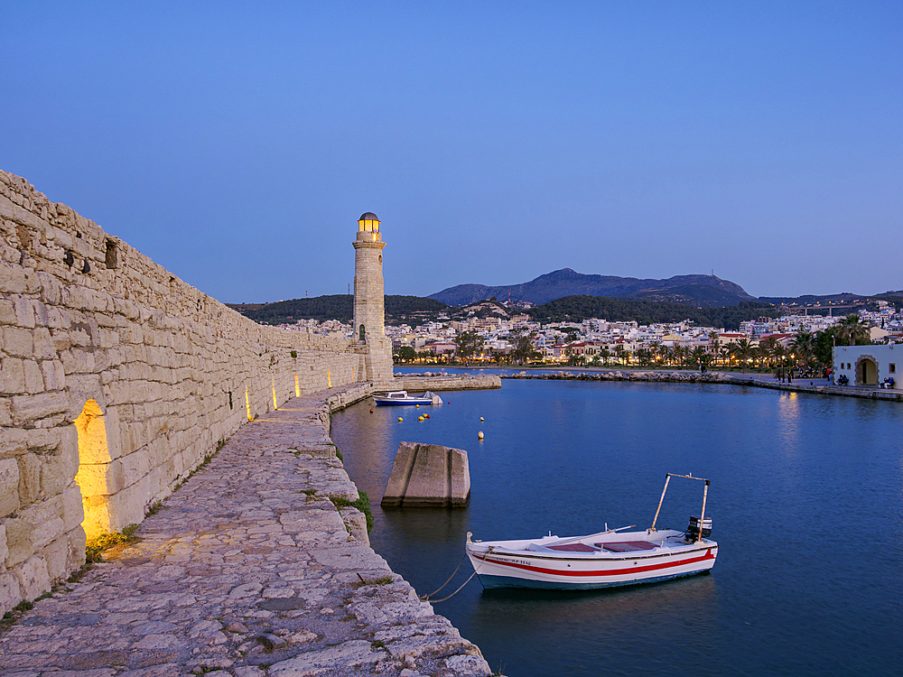 Lighthouse at the Old Venetian Port, dusk, City of Rethymno, Rethymno Region, Crete, Greek Islands, Greece, Europe