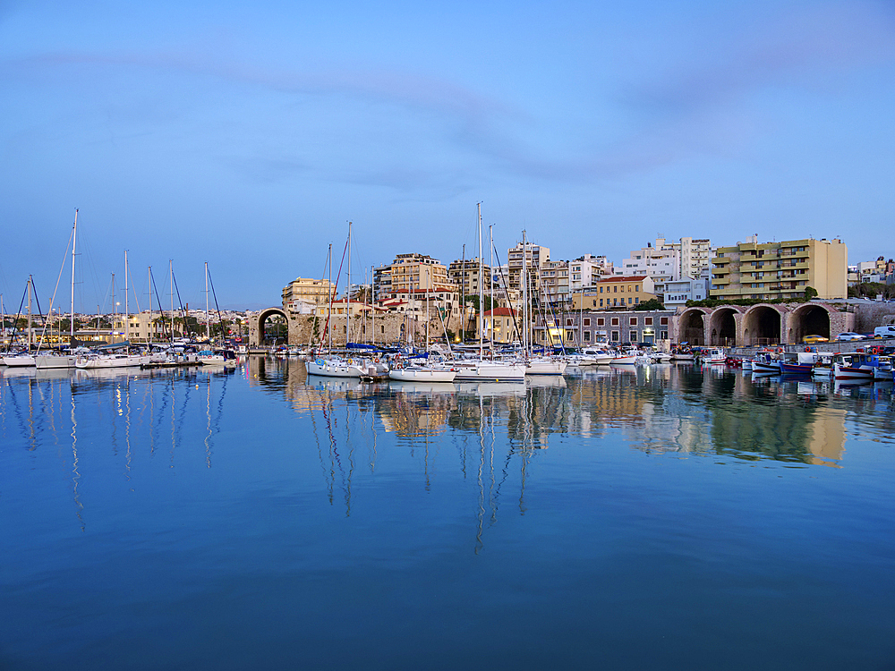 Venetian Dockyards at the Old Port at dusk, City of Heraklion, Crete, Greek Islands, Greece, Europe