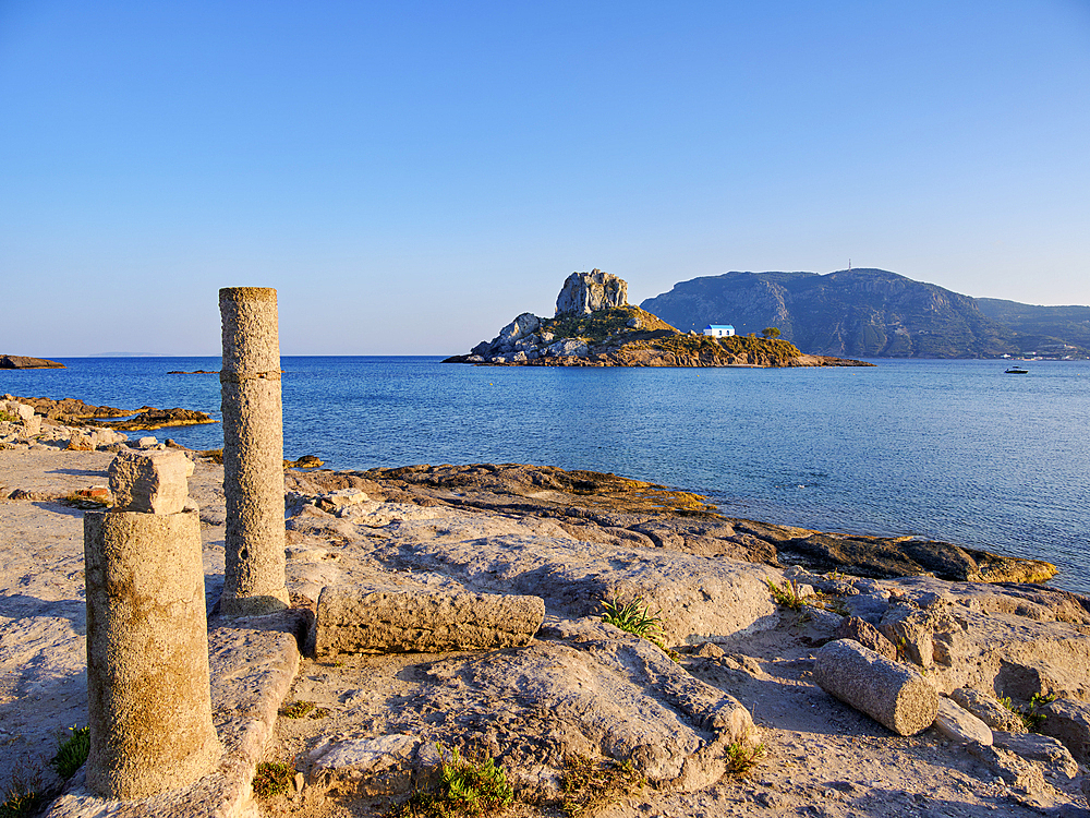 St. Stefanos Basilica Ruins and Kastri Island at sunset, Agios Stefanos Beach, Kos Island, Dodecanese, Greek Islands, Greece, Europe