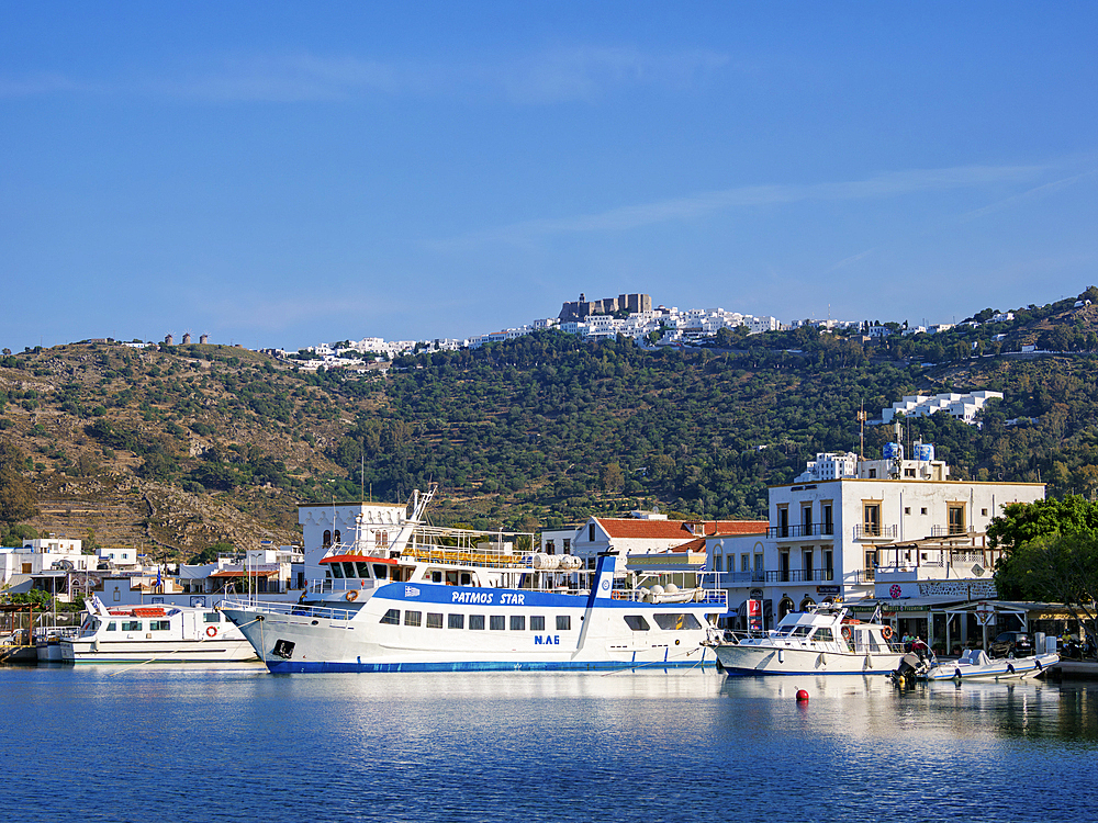 View over Skala Port towards the Monastery of Saint-John the Theologian and Patmos Chora, Patmos Island, Dodecanese, Greek Islands, Greece, Europe