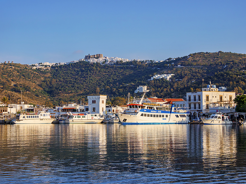 View over Skala Port towards the Monastery of Saint-John the Theologian and Patmos Chora, Patmos Island, Dodecanese, Greek Islands, Greece, Europe