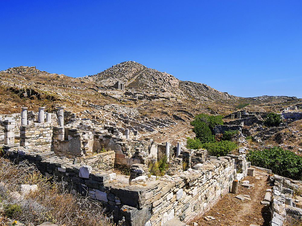 View towards the Temple of Isis and Mount Kynthos, Delos Archaeological Site, UNESCO World Heritage Site, Delos Island, Cyclades, Greek Islands, Greece, Europe