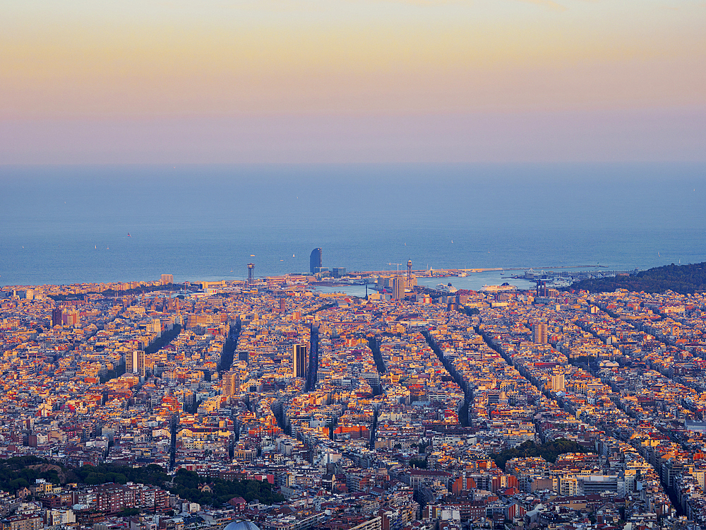 Cityscape at sunset seen from Mount Tibidabo, Barcelona, Catalonia, Spain, Europe