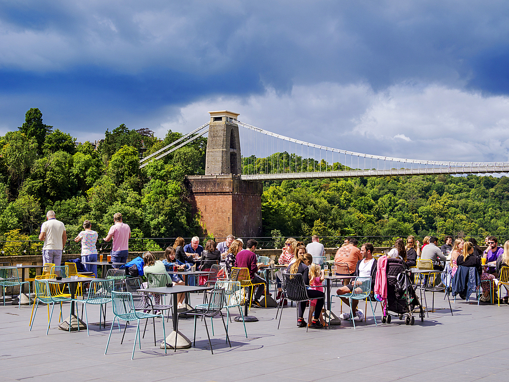 People eating al fresco at Avon Gorge by Hotel du Vin, Clifton Suspension Bridge in the background, Bristol, England, United Kingdom, Europe