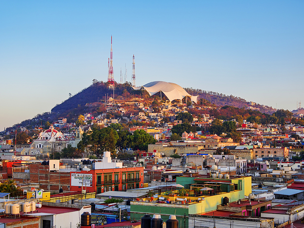 View towards the Cerro del Fortin at sunrise, Oaxaca de Juarez, Oaxaca State, Mexico