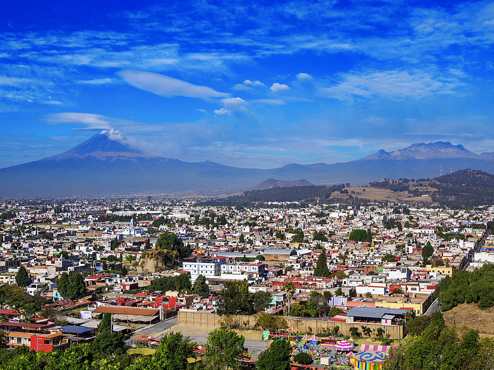 View over the city towards Popocatepetl and Iztaccihuatl Volcanoes, Cholula, Puebla State, Mexico