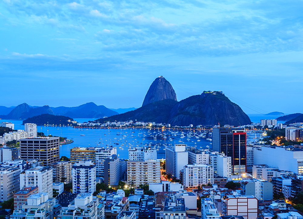 View over Botafogo towards the Sugarloaf Mountain at twilight, Rio de Janeiro, Brazil, South America