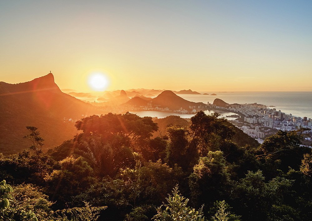 View from Vista Chinesa over Tijuca Forest towards Rio de Janeiro at sunrise, Brazil, South America