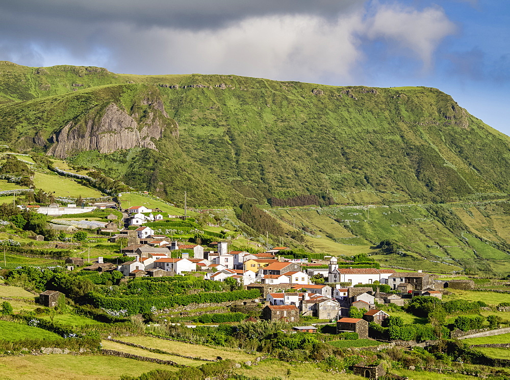 View towards Mosteiro Village and Rocha dos Bordoes, Flores Island, Azores, Portugal, Atlantic, Europe