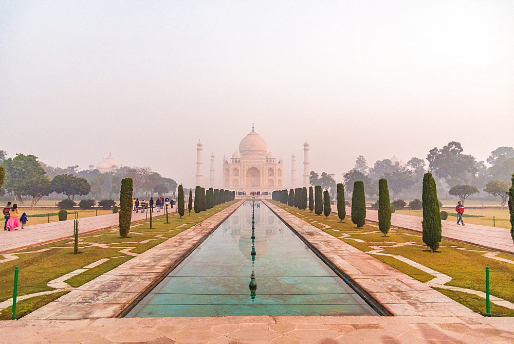 Taj Mahal reflections on a misty morning, UNESCO World Heritage Site, Agra, Uttar Pradesh, India, Asia