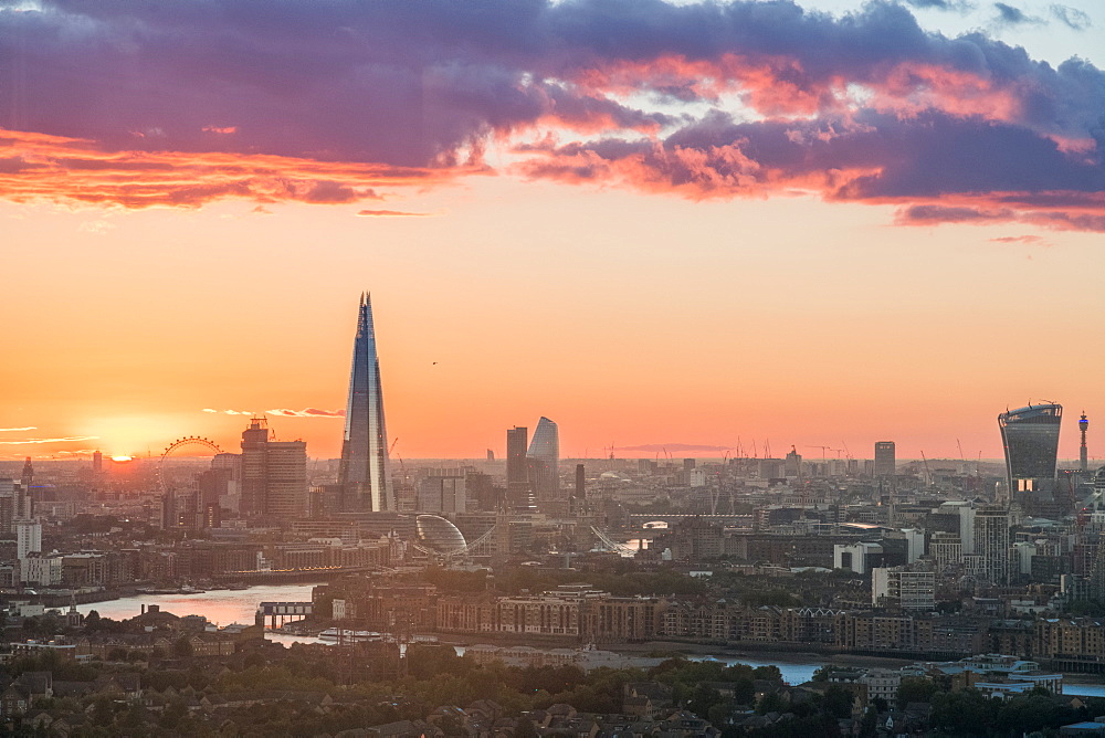 The sun sets over the City of London, London, England, United Kingdom, Europe