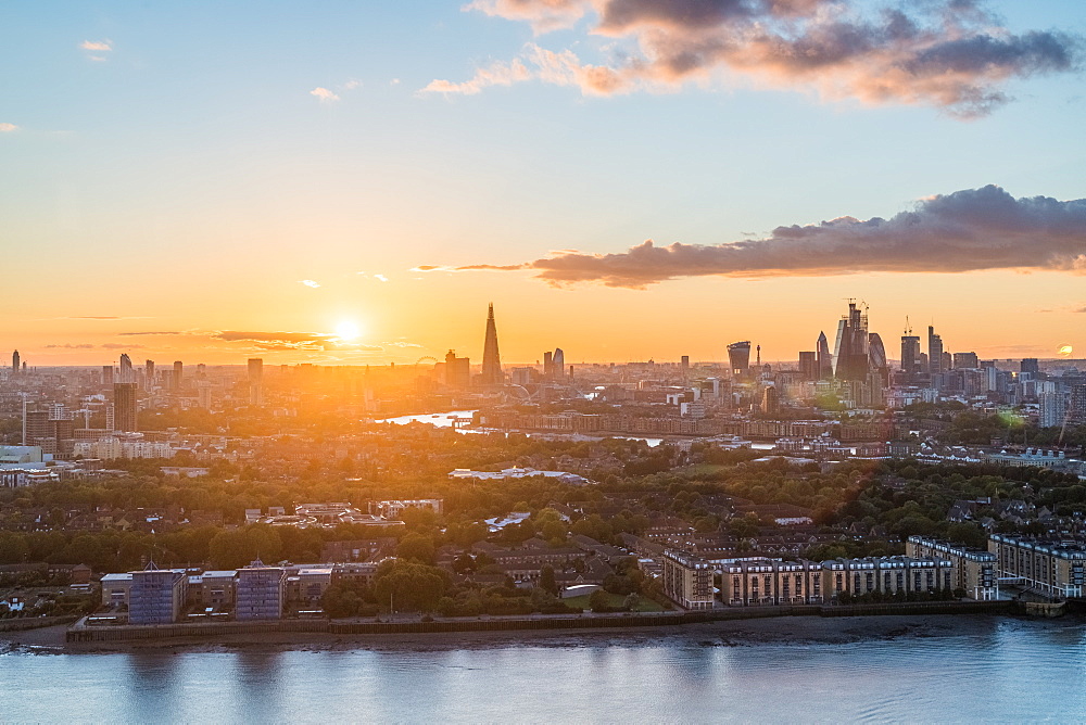 The sun sets over the City of London, London, England, United Kingdom, Europe