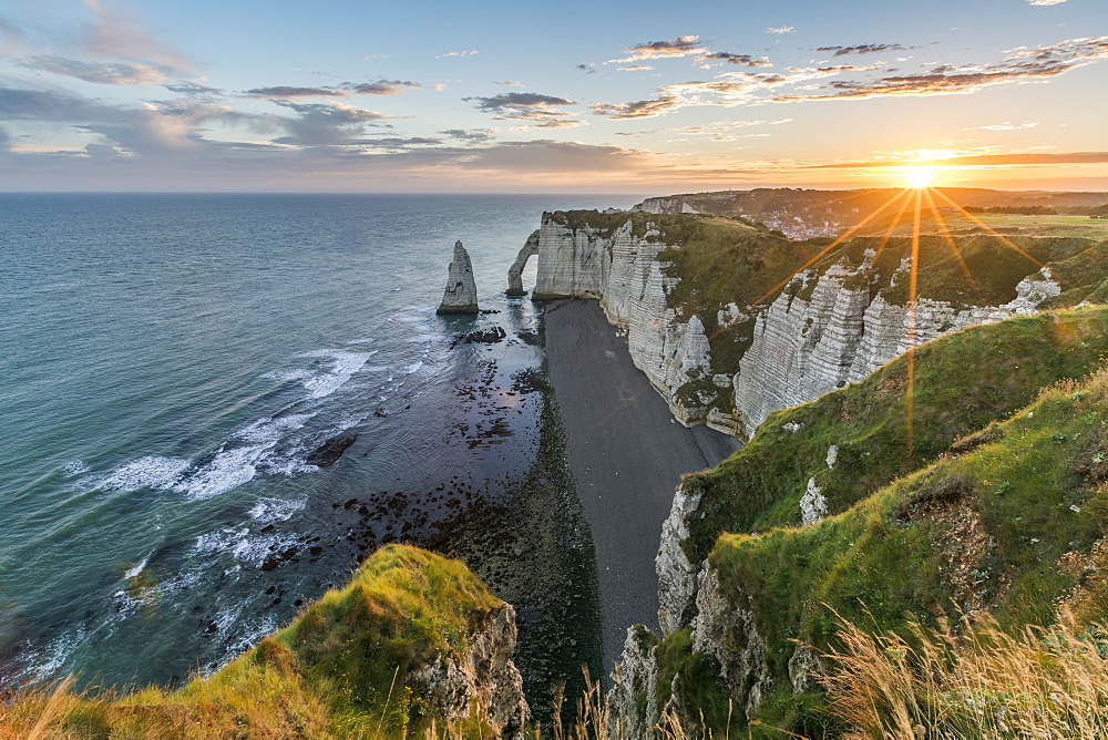 Sunrrays at dawn at the cliffs, Etretat, Normandy, France, Europe