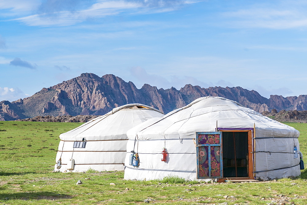 Mongolian gers and mountains in the background, Middle Gobi province, Mongolia, Central Asia, Asia