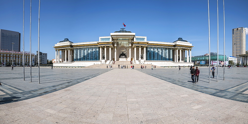 Tourists in Sukhbaatar square with Government palace, Ulan Bator, Mongolia, Central Asia, Asia