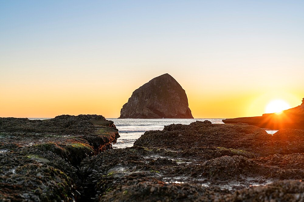 Haystack Rock at Cape Kiwanda at sunset, Pacific City, Tillamook county, Oregon, United States of America, North America