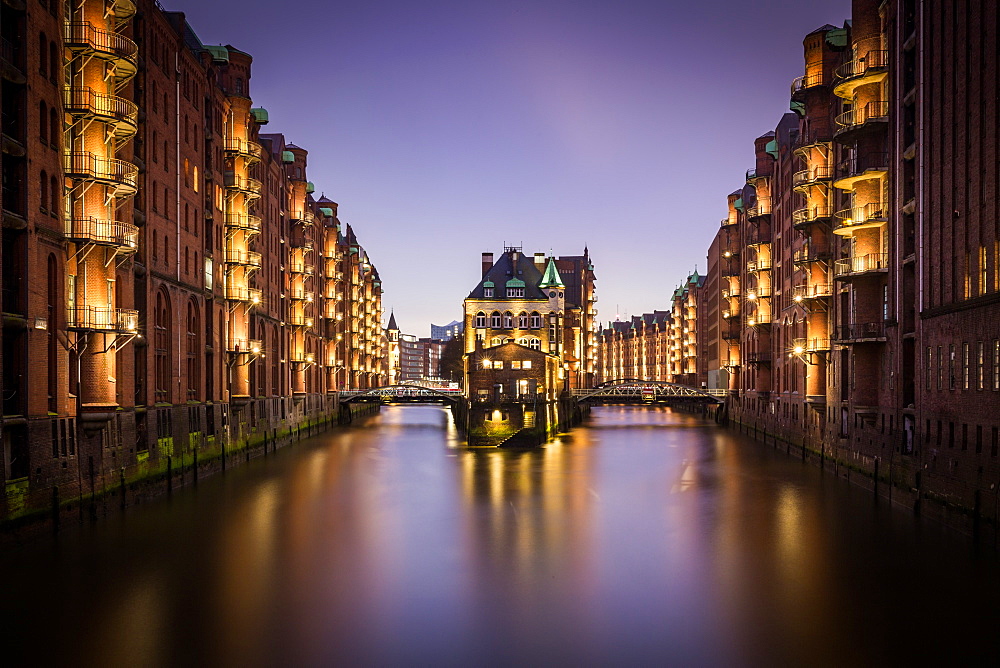 A long exposure blue hour shot of the Speicherstadt warehouse district in Hamburg, Germany, Europe