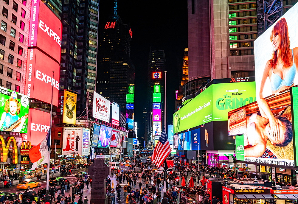 The chaos and lights of New York City's Times Square, New York, United States of America, North America