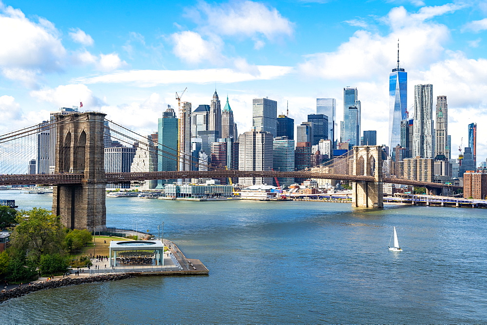 The view over the East River towards the Brooklyn Bridge and Lower Manhattan, New York, United States of America, North America