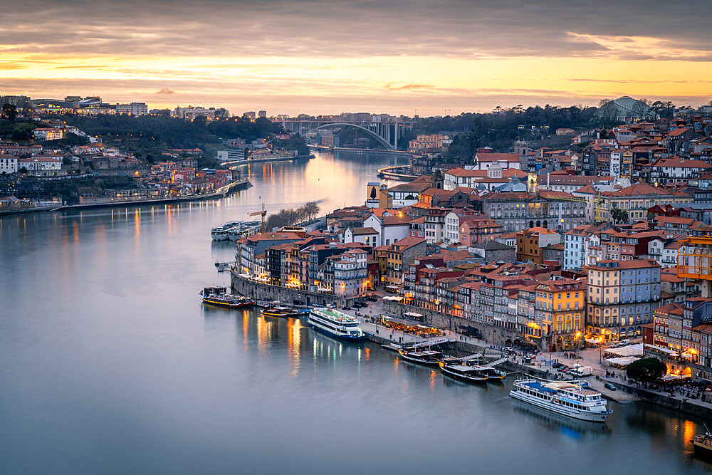 Sunset over Porto looking towards the Ribeira district from the Dom Luis I Bridge, UNESCO World Heritage Site, Porto, Portugal, Europe