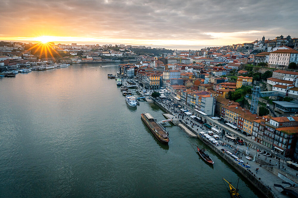 Sunset over Porto looking towards the Ribeira district from the Dom Luis I Bridge, UNESCO World Heritage Site, Porto, Portugal, Europe