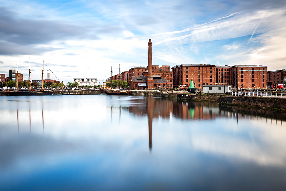 The Pump House pub and Albert Dock buildings reflected in a still Canning Dock, Liverpool, Merseyside, England, United Kingdom, Europe