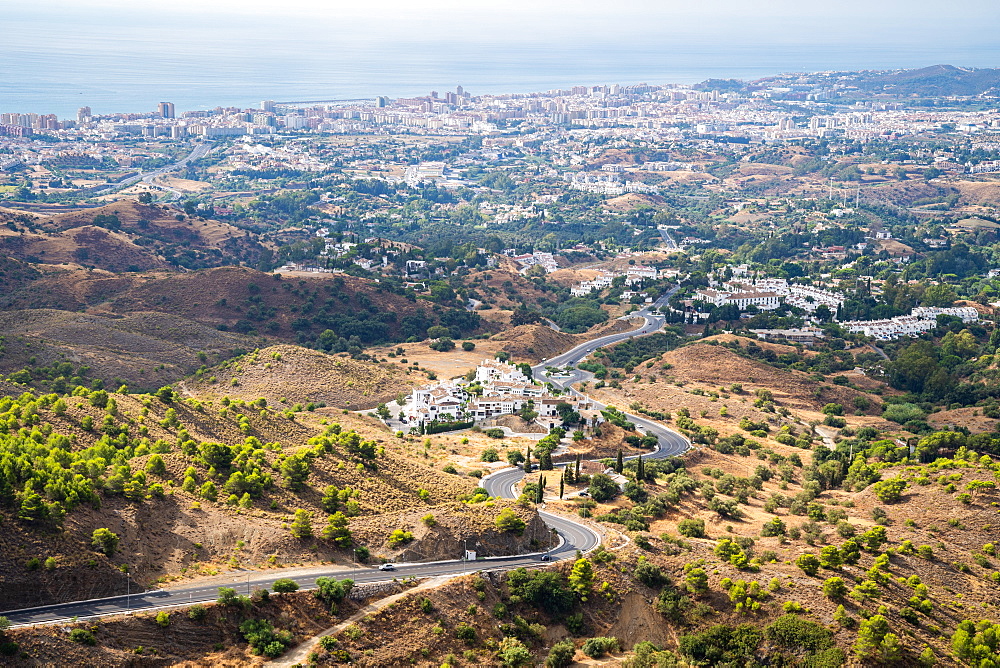 The view towards Fuengirola, the Costa del Sol and Mediterranean sea from Mijas Pueblo, Andalusia, Spain, Europe