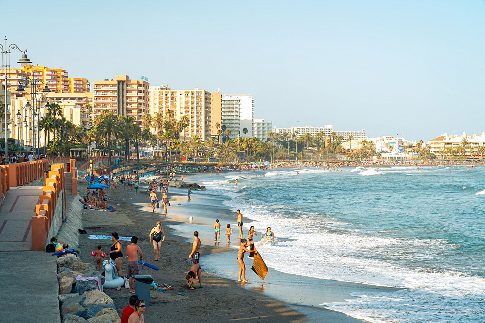 People enjoying the beach at Benalmadena on the Costa Del Sol, Andalusia, Spain, Europe