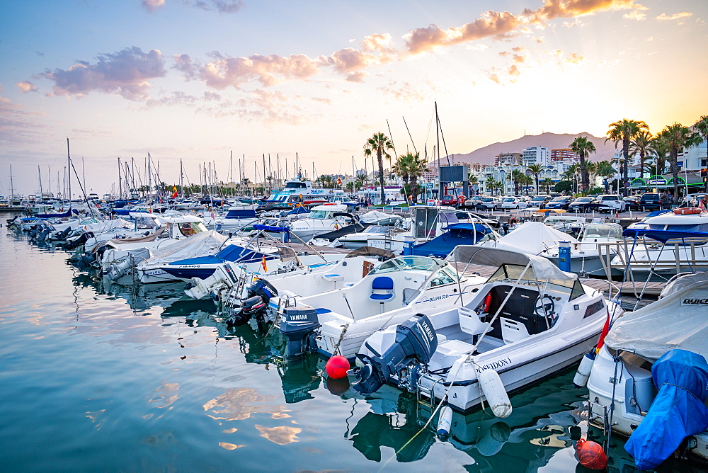 Boats at sunset at Benalmadena Puerto Marina between the Costa Del Sol beach resorts of Benalmadena and Torremolinos, Andalusia, Spain, Europe