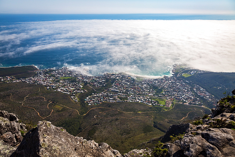 The view from Table Mountain over Camps Bay covered in low cloud, Cape Town, South Africa, Africa