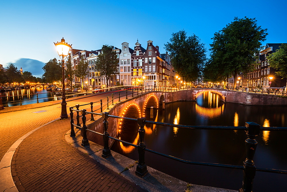 A long exposure of Amsterdam's southern canal rings at the intersection of Leidsegracht and Keizersgracht, Amsterdam, The Netherlands, Europe